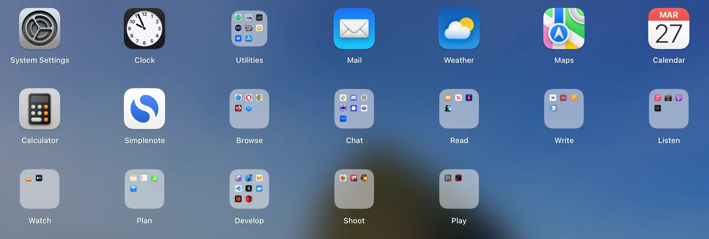 A screenshot of the MacOS Launchpad app—A screenshot of the (organized) Launchpad app on MacOS.